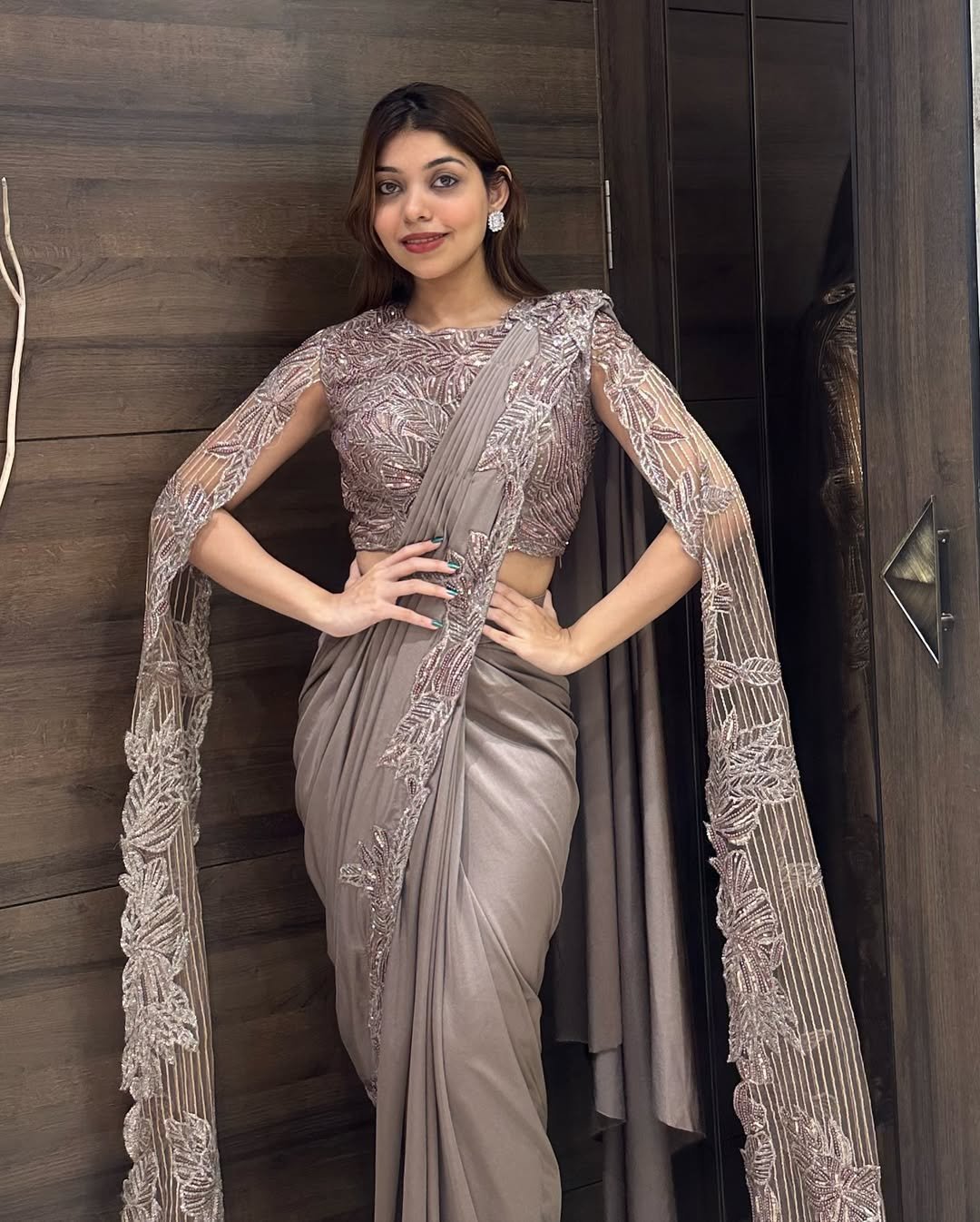 Designer Satin Drape Saree with Embellished Cape Blouse - Image 4